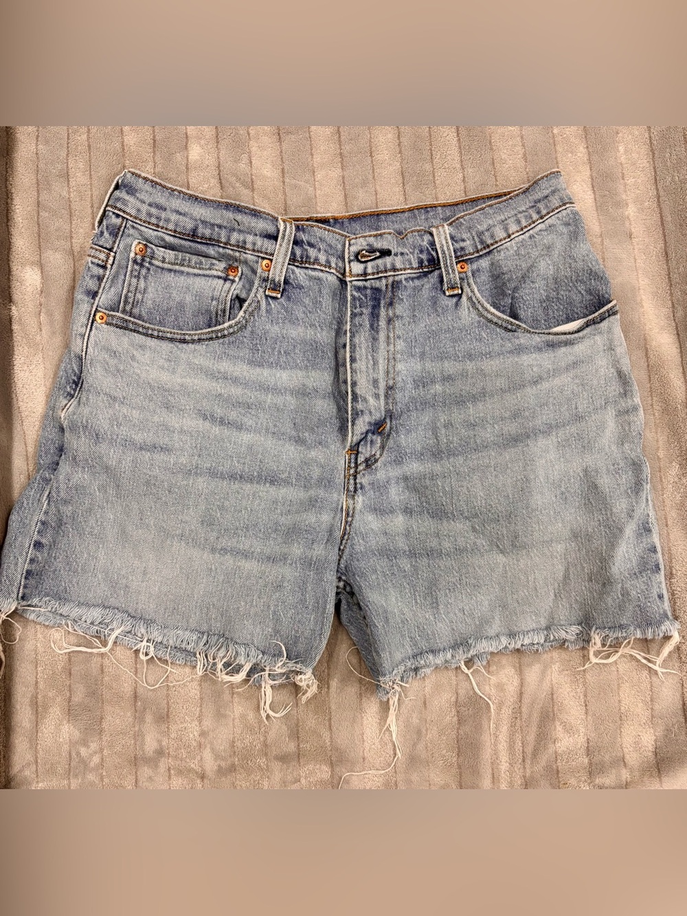 Levi's Light Blue Raw Hem Denim Cutoff Shorts